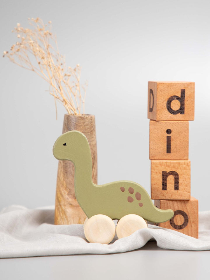 Birch Dino Roller Toy