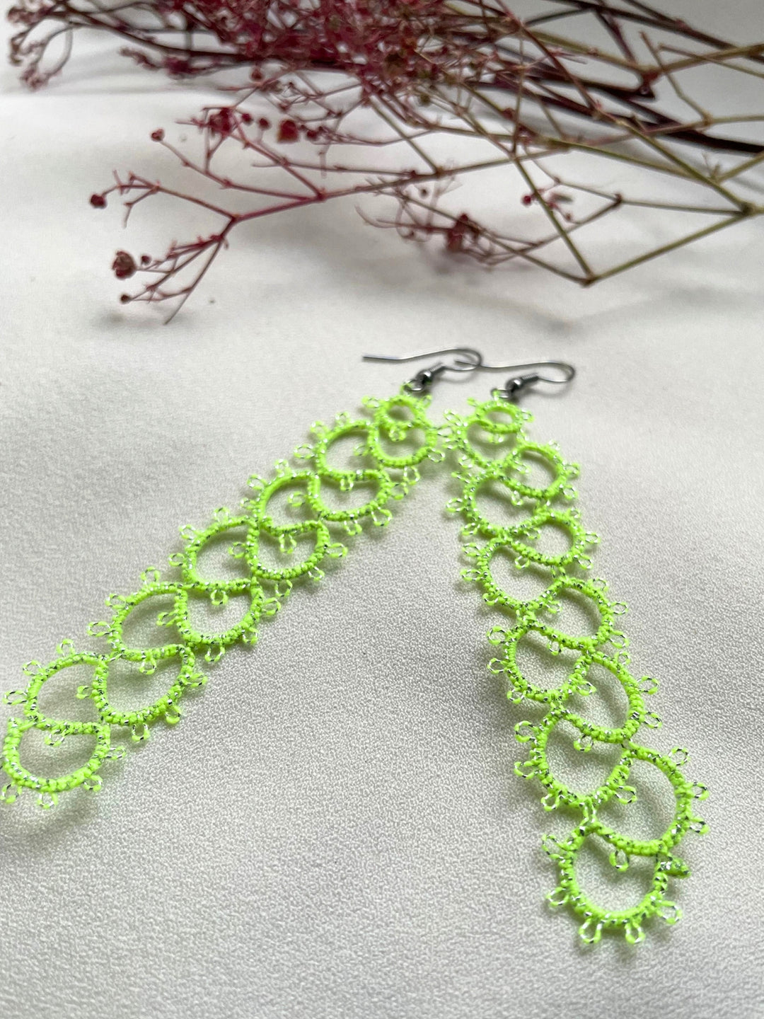 Fluorescent Lime Glow Earrings Knots to Node