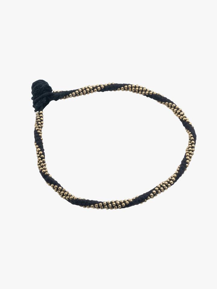 AnkletBlack Patwa Thread Anklet with Gold - Toned BeadsKaladoraFlourish Planet