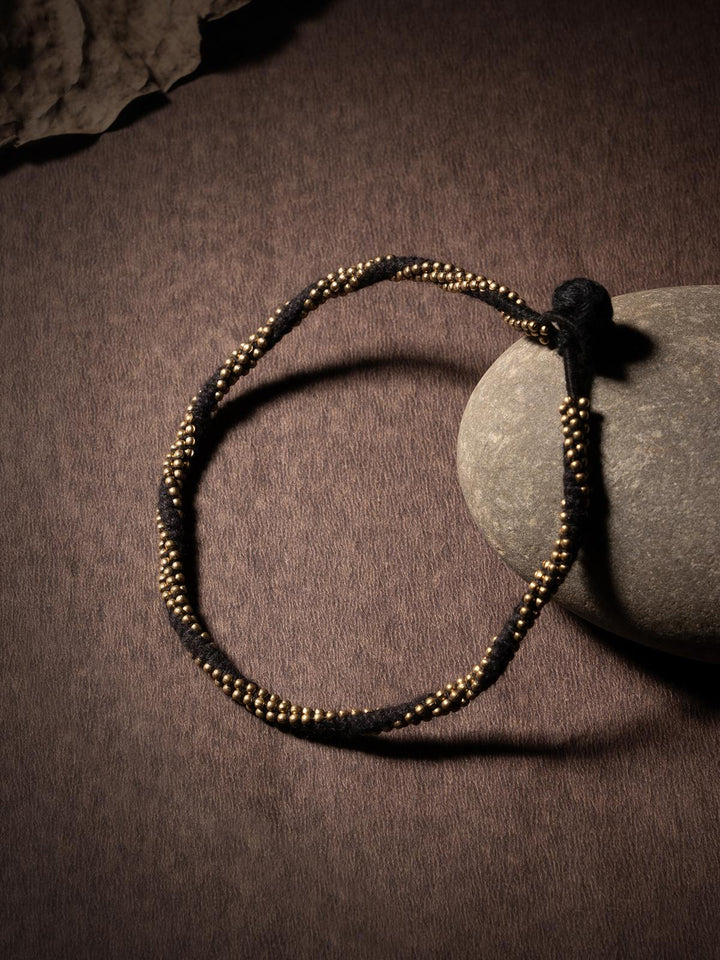 AnkletBlack Patwa Thread Anklet with Gold - Toned BeadsKaladoraFlourish Planet