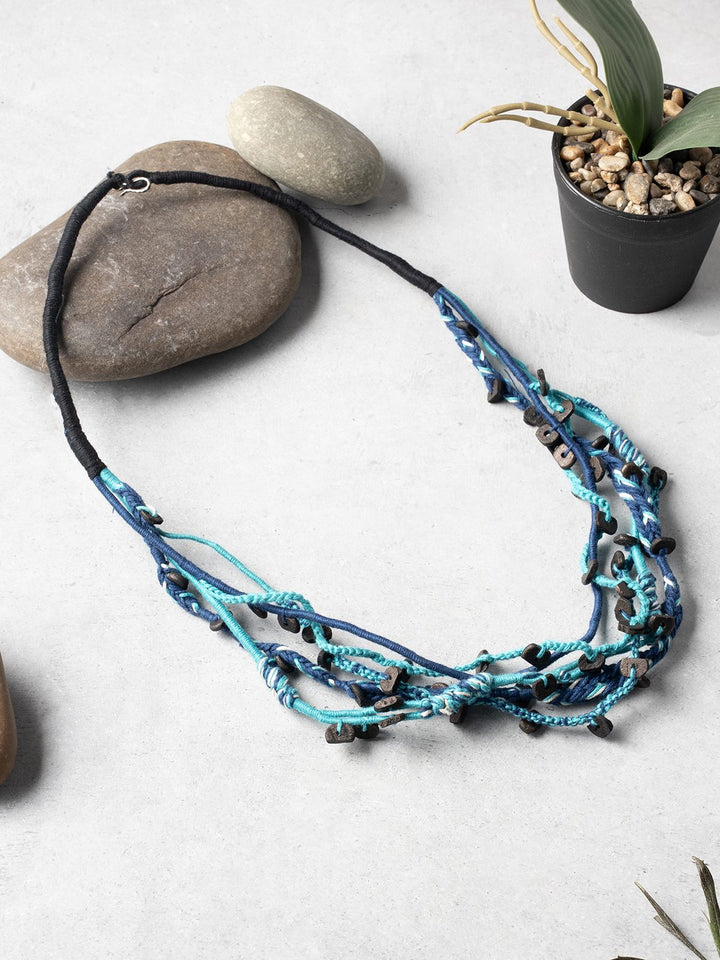 NecklaceBlue & Black Patwa Thread Necklace with Natural Wood AccentsKaladoraFlourish Planet