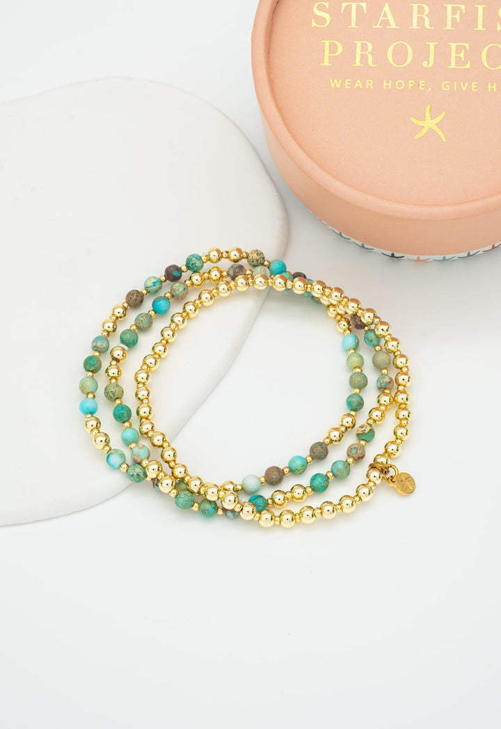 Bangles & BraceletsLight We Carry Bracelet Set in TurquoiseStarfish ProjectFlourish Planet