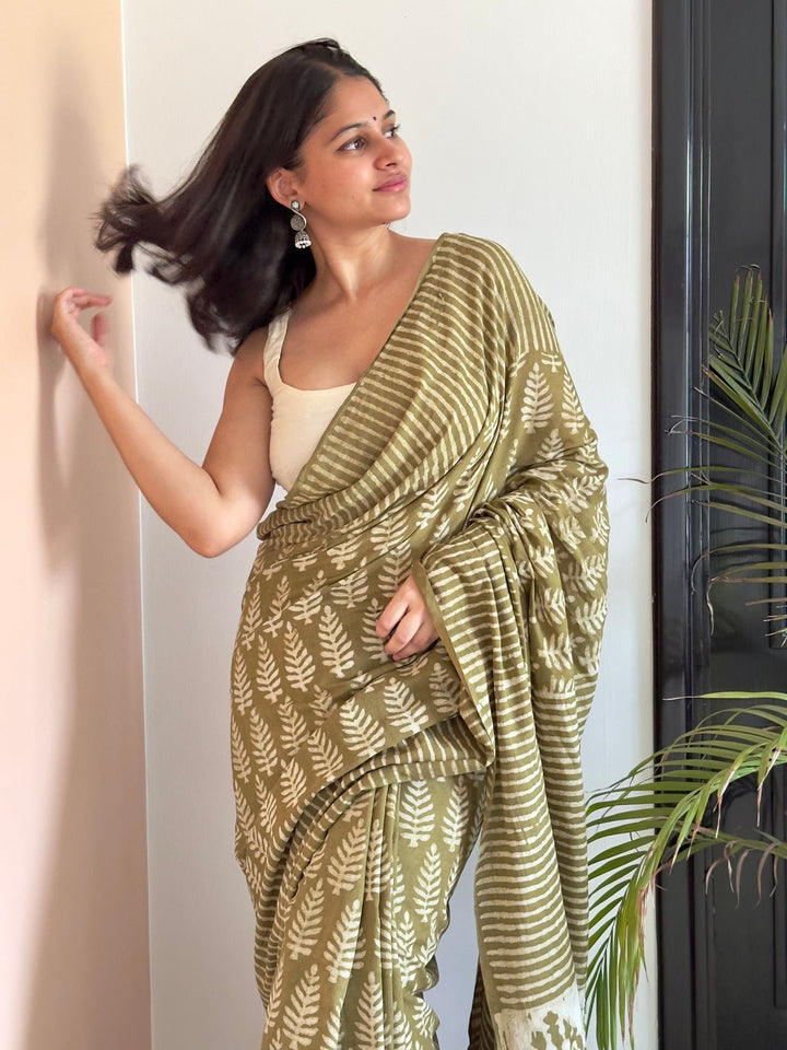 SareesPehla Saawan Green Dabu Print SareePolki by Bhagwati SareesFlourish Planet